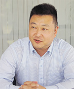 株式会社フジワーク エンジニアリング本部 システム事業部 第二システム開発課 統括リーダー 岡本彩士氏